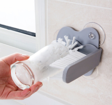 This is a creative suction wall lazy cup brush